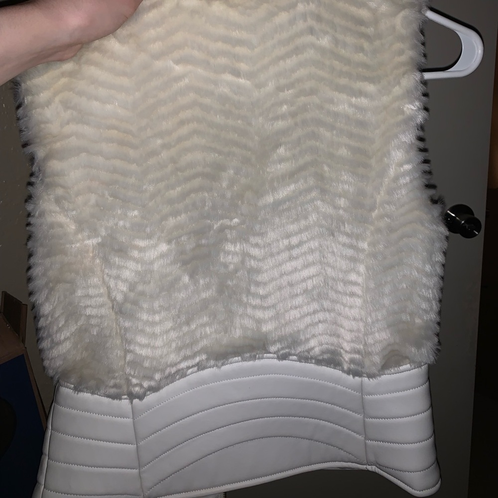 Leather vest with fur